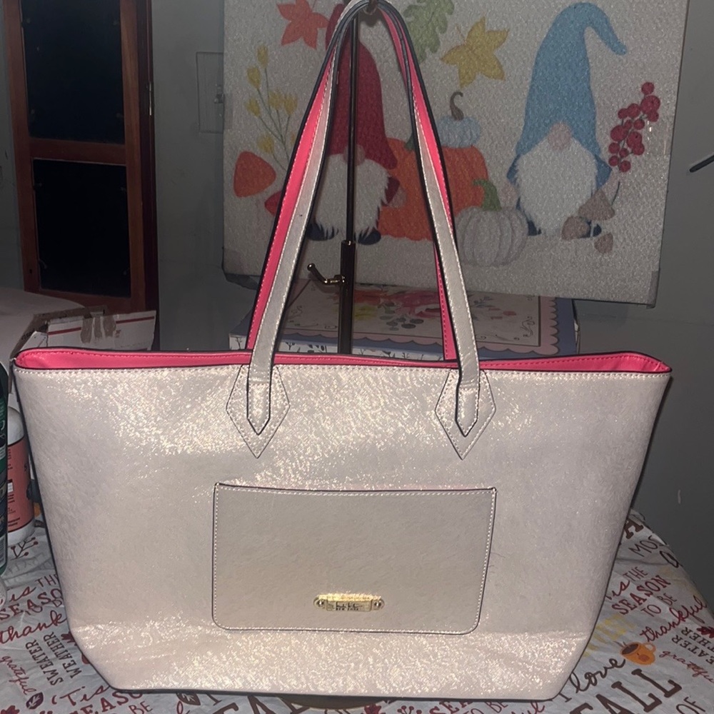 GUC! Gold shoulder bag with pink trim on handles & interior.